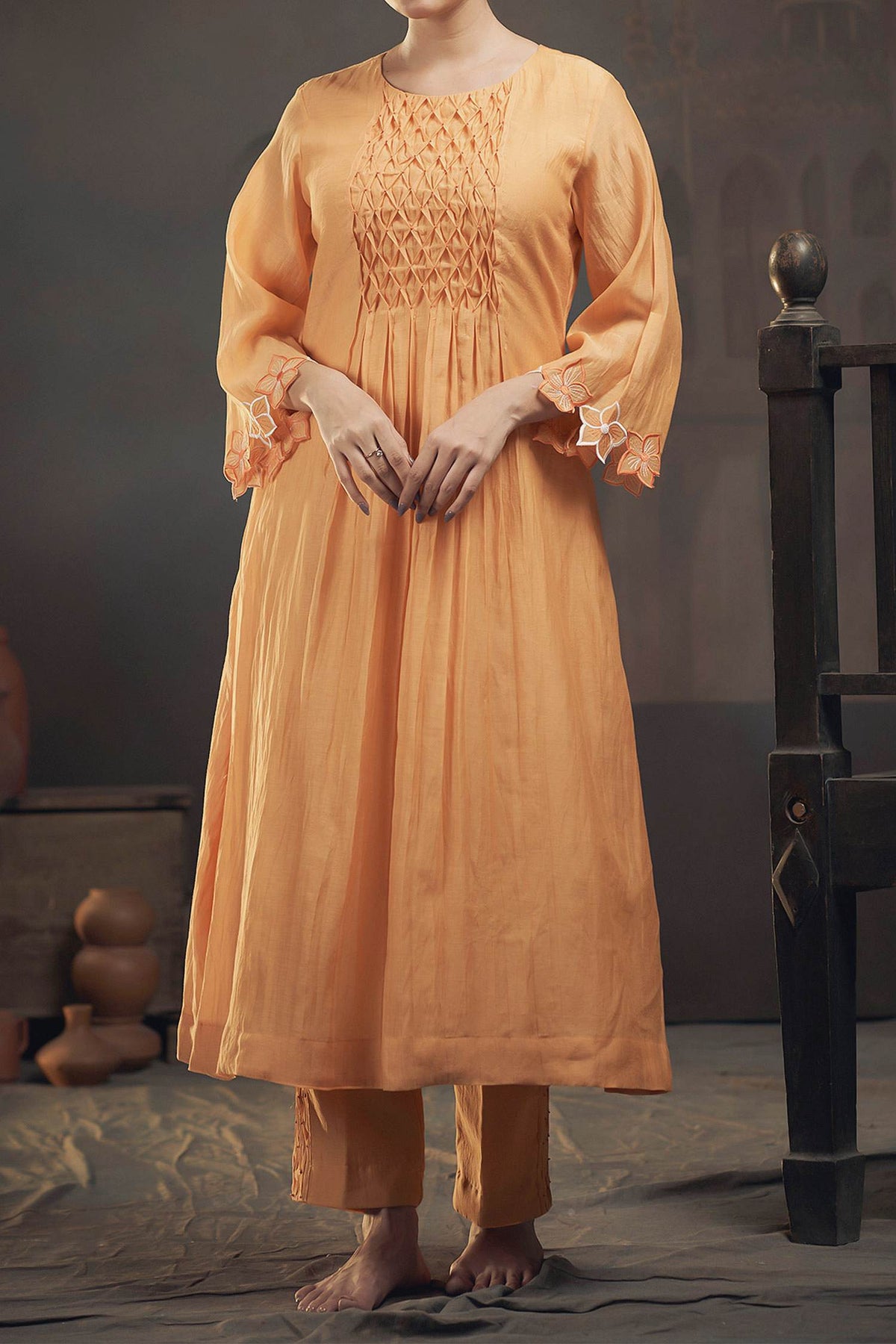 Shop Hirika & Dhruti Yellow Chanderi Smocked Gathered Kurta With Pant For Kids at Aza Fashions